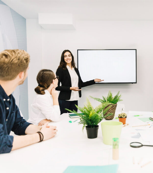 business-partners-looking-female-manager-giving-presentation